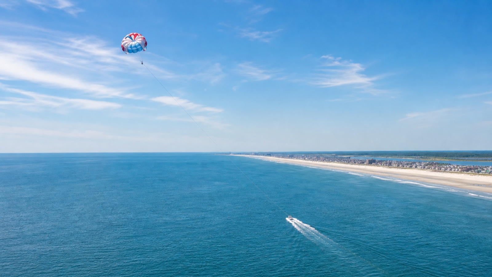 Parasail and boat above the Atlantic Ocean near Wildwood Crest with no people visible